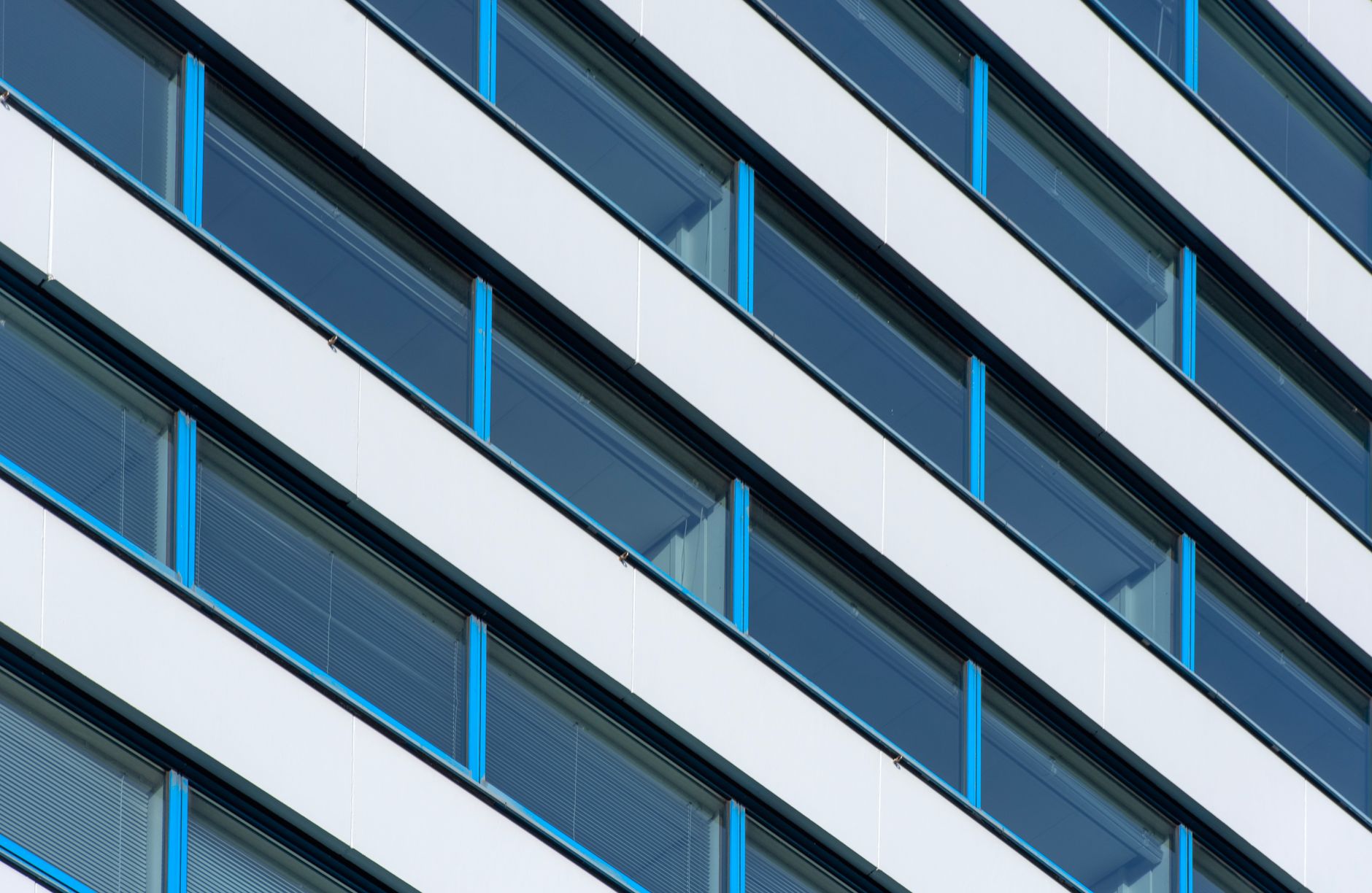 Facade of an office building with blue window frames